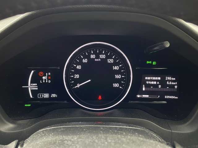 ホンダ ヴェゼル ハイブリッド X ホンダセンシング 兵庫県 2020(令2)年 4万km プラチナホワイトパール ・純正SDナビ（VXM-２０５Ci）/　Bluetoothオーディオ/　CD/DVD再生/　USB接続/・前後ドライブレコーダー/・チップアップシート/・純正フロアマット/・純正16インチアルミホイール/・レーダークルーズコントロール/・衝突被害軽減システム/・レーンキープアシスト/・ABS/・横滑り防止機能/・盗難防止装置/・オートライト/・LEDヘッドライト/・W＋サイドエアバック/・カーテンエアバック/・ステアリングリモコン/・パドルシフト/・スマートキー/・AACエアコン/　