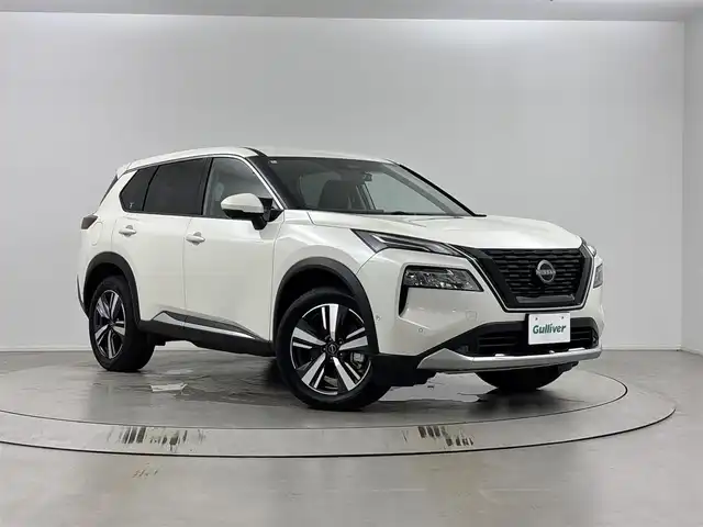 日産 エクストレイル G e－4ORCE 埼玉県 2024(令6)年 0.2万km ブリリアントホワイトパール 純正ナビ（Bluetooth/AM/FM）/フルセグTV/プロパイロット/エマージェンシーブレーキ/アラウンドビューモニター/車線逸脱防止機能/踏み間違え防止機能/横滑り防止装置/レーンキープアシスト/盗難防止装置/オートライト/LEDヘッドライト/コーナーセンサー/ワイアレス充電/ステアリングヒーター/デジタルインナーミラー/全席シートヒーター/ドライブレコーダー/ETC2.0/スマートキー
