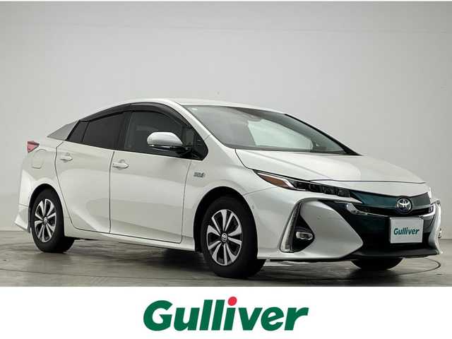 トヨタ プリウス ＰＨＶ A 滋賀県 2017(平29)年 7.9万km ホワイトパールクリスタルシャイン モデリスタエアロ（リア）/純正11.6インチナビ/【Bluetooth/フルセグTV/USB/iPod】/バックカメラ/ETC/セーフティセンスP/・プリクラッシュセーフティ/・レーンディパーチャーアラート/・アダプティブハイビーム/・レーダークルーズコントロール/ブラインドスポットモニター/インテリジェントクリアランスソナー/パーキングアシスト/シートヒーター/ハンドルヒーター/スマートキー/LEDヘッドライト/オートライト