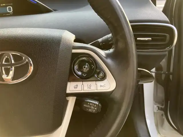 トヨタ プリウス ＰＨＶ A 滋賀県 2017(平29)年 7.9万km ホワイトパールクリスタルシャイン モデリスタエアロ（リア）/純正11.6インチナビ/【Bluetooth/フルセグTV/USB/iPod】/バックカメラ/ETC/セーフティセンスP/・プリクラッシュセーフティ/・レーンディパーチャーアラート/・アダプティブハイビーム/・レーダークルーズコントロール/ブラインドスポットモニター/インテリジェントクリアランスソナー/パーキングアシスト/シートヒーター/ハンドルヒーター/スマートキー/LEDヘッドライト/オートライト