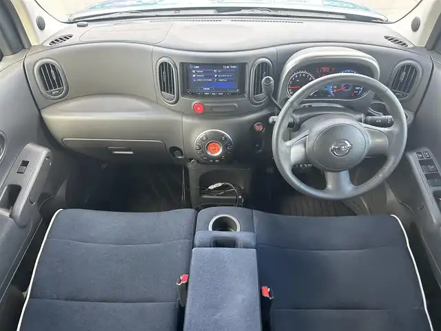 日産 キューブ 15X FOUR インディゴ+プラズマ 岡山県 2011(平23)年 10万km アッシュブルー 登録時走行距離100083km/社外ナビ（Clarion　NX612）/フルセグTV(AM.FM.CD.DVD.TV)/４WD/ETC/盗難防止装置/オートライト/フロアマット/スマートキー/プッシュスタート/ドアバイザー/保証書/取扱説明書