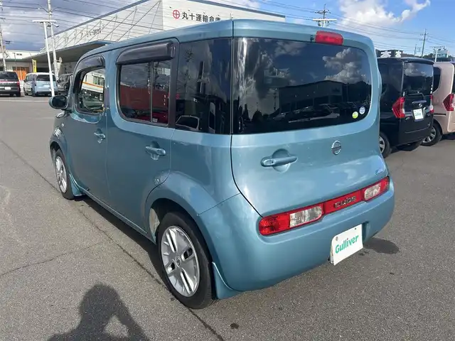 日産 キューブ 15X FOUR インディゴ+プラズマ 岡山県 2011(平23)年 10万km アッシュブルー 登録時走行距離100083km/社外ナビ（Clarion　NX612）/フルセグTV(AM.FM.CD.DVD.TV)/４WD/ETC/盗難防止装置/オートライト/フロアマット/スマートキー/プッシュスタート/ドアバイザー/保証書/取扱説明書