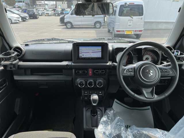 スズキ ジムニー シエラ JC 石川県 2024(令6)年 1.5万km Ｄグリーン 4WD/社外メモリーナビ/フルセグTV/バックカメラ/レーダーブレーキ/純正アルミホイール/スマートキー/プッシュスタート/電動ミラー/クルーズコントロール/マッドフラップ/LEDヘッドライト/ETC