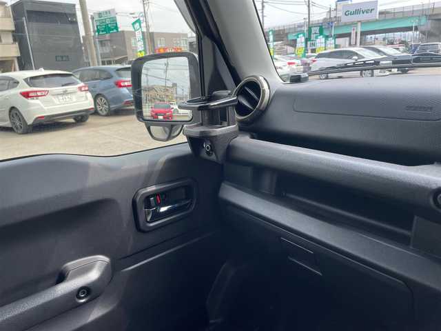 スズキ ジムニー シエラ JC 石川県 2024(令6)年 1.5万km Ｄグリーン 4WD/社外メモリーナビ/フルセグTV/バックカメラ/レーダーブレーキ/純正アルミホイール/スマートキー/プッシュスタート/電動ミラー/クルーズコントロール/マッドフラップ/LEDヘッドライト/ETC