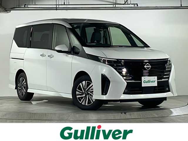 日産 セレナ e－パワー ハイウェイスター V 広島県 2025(令7)年 0.1万km プリズムホワイト 禁煙車/寒冷地仕様(ホットプラスパッケージ)+不凍液+PTC素子ヒーター/アラウンドビューモニター/インテリジェントインナーミラー/ドライブレコーダー/LEDヘッドライト/SOSコール/エマージェンシーブレーキ/横滑り防止装置/車線維持支援/標識検知支援/ハイビームアシスト/BSW/コーナーセンサー/プロパイロット/純正12.3型メモリナビ/（AM/FM/BT/フルセグTV/HDMI/USB）/ワイヤレス充電/ステアリングヒーター/ステアリングスイッチ/シートヒーター（１列目/2列目）/ハーフレザーシート/ハンズフリー両側パワースライドドア/電動パーキングブレーキ/オートホールド/ウォークスルー/スマートキー/プッシュスタートボタン/スペアキー/純正１６インチアルミホイール/ETC2.0