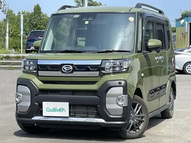 ダイハツ タント ファンクロス 道央・札幌 2022(令4)年 1.5万km フォレストカーキメタリック ４WD/純正ディスプレイオーディオ/AM/FM/BT/フルセグ/衝突被害軽減ブレーキ/横滑り防止装置/レーンキープアシスト/コーナーセンサー/バックカメラ/アイドリングストップ/PWRMODE/両側パワースライドドア/前席シートヒーター/ステアリングリモコン/電動パーキング/ブレーキホールド/プッシュスタート/スマートキー/LEDヘッドライト/オートライト/オートハイビーム/フォグランプ/ヘッドライトレベライザー/電動格納ミラー/純正フロアマット/ドアバイザー/社外AW付冬タイヤ積込/155/65/R14/2023年/山8mm