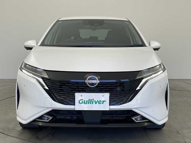 日産 オーラ G 兵庫県 2021(令3)年 3.9万km ピュアホワイトパール ワンオーナー車/純正ナビ(フルセグ/BT/DVD/CD)/アラウンドビューモニター/エマージェンシーブレーキ/車線逸脱警報システム/後車両検知警報システム/標識検知システム/AHB/ステアリングスイッチ/前席シートヒーター/ステアリングヒーター/ハーフレザーシート/スマートルームミラー/ナビ連動ドラレコ/LEDヘッドライト/オートライト/電子パーキング/オートホールド