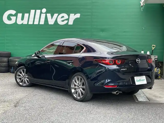 マツダ マツダ３セダン 20S Lパッケージ 東京都 2020(令2)年 2.1万km ディープクリスタルブルーマイカ 純正SDナビ/(AM/FM/CD/DVD/フルセグTV/Bluetooth)/360度セーフティパッケージ/レーダークルーズコントロール/クルージングトラフィックサポート/スマートブレーキサポート/交通標識認識システム/ドライブレコーダー前後/(XLDR-L2)/車線逸脱警報システム/ブラインドスッポトモニター/パーキングセンサー前後/ヘッドアップディスプレイ/純正フロアマット/パワーシート/前席シートヒーター/ステアリングヒーター/ETC/スペアキー×1/取扱説明書