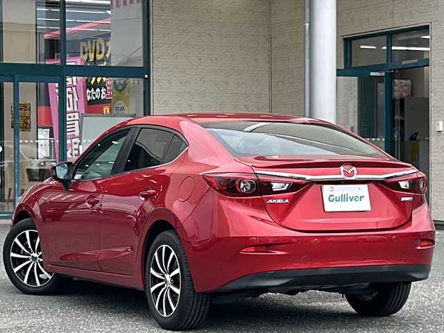 マツダ アクセラ ハイブリッド S 愛知県 2015(平27)年 8万km ソウルレッドプレミアムメタリック 登録時走行距離79864km/純正マツダコネクト7インチメモリナビ/（Bluetooth/フルセグTV/DVD）/バックカメラ/社外コーナーセンサー/DVDプレイヤー/リアビークルモニタ/アイアクティブセンス/スマートシティブレーキ/誤発進抑制機能/オートマチックハイビーム/アダブティブフロントライティングシステム/クルーズコントロール/ヘッドアップディスプレイ/ステアリングスイッチ/マルチインフォメーションディスプレイ/スマートキー/純正フロアマット/取説/保証書