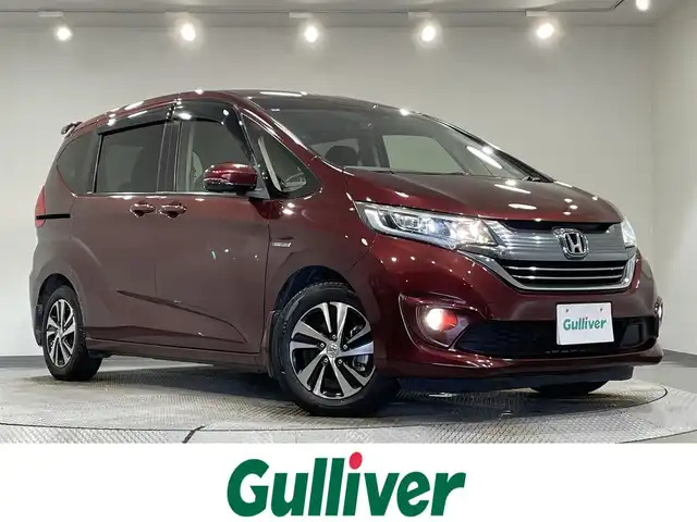 ホンダ フリード ハイブリット EX 愛知県 2017(平29)年 4.5万km プレミアムディープロッソパール 純正ギャザズナビ（VXM-185VFi）/（Bluetooth/FM/AM/フルセグTV/SD)/ホンダセンシング　/　　-衝突軽減ブレーキ　/　　-車線維持支援システム/　　-アダプティブクルーズコントロール/　　-標識認識機能/　　-路線逸脱警報/両側パワースライドドア　/ビルトインＥＴＣ　/シートヒーター　/ＬＥＤヘッドライト　/バックカメラ　/ドライブレコーダー　/後席サンバイザー　/純正フロアマット　/フォグランプ
