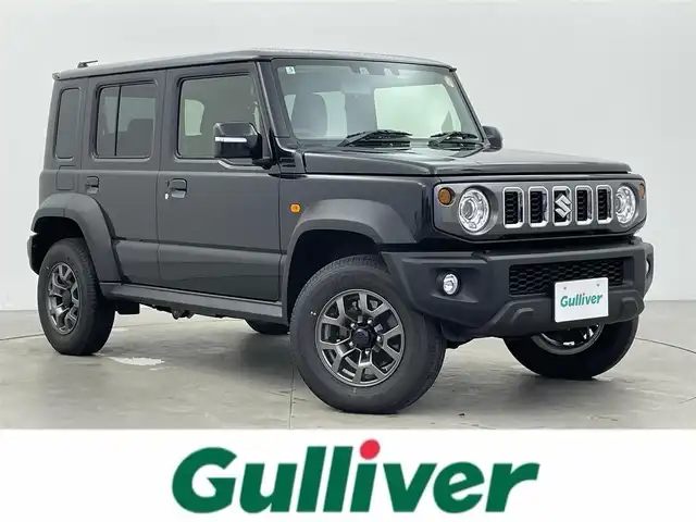 スズキ ジムニー ノマド 富山県 2025(令7)年 0.1万km 黒 ワンオーナー/4WD/ディスプレイオーディオ(AM/FM/BT/AUX/AndoroidAuto)/バックカメラ/背面タイヤ/衝突被害軽減システム/レーンキープアシスト/レーダークルーズコントロール/ダウンヒルアシストコントロール/前席シートヒーター/センターデフロック/コーナーセンサー/横滑り防止装置/盗難防止装置/ヘッドランプウォッシャー/LEDヘッドライト/オートマチックハイビーム/オートライト　/フォグランプ/アイドリングストップ/純正AW /プッシュスタート/スマートキー/スペアキー×1/取扱説明書/保証書
