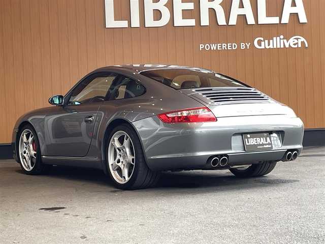 ポルシェ ９１１ カレラS 宮城県 2005(平17)年 7.5万km シールグレー スポーツクロノパッケージ/PASM/サンルーフ/ブラウンレザーインテリア/社外HDDナビ/バックカメラ/メモリ機能付きパワーシート/シートヒーター/キセノンヘッドライト/クルーズコントロール/純正19インチAW/レッドブレーキキャリパー/キーレスキー/ETC