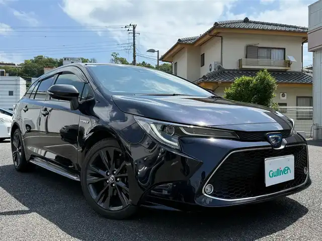 トヨタ カローラツーリング ハイブリッド ダブルバイビー 静岡県 2020(令2)年 8万km スパークリングブラックパールクリスタルシャイン ワンオーナー・保証書/車検令和9年6月29日まで/純正マルチメディア/　・ナビゲーション /USB/　・地デジ　/　・DVDプレイヤー/　・Bluetoothオーディオ/バックカメラ/ETC/ハーフレザーシート/前席シートヒーター/クルーズコントロール/ステアリングヒーター/スマートキー/プッシュスタート/電動パーキングブレーキ/純正LEDヘッドライト/LEDデイライト/純正ドアバイザー/純正フロアマット/オートハイビーム/ライトレベライザー/車両取説＋ナビ取説
