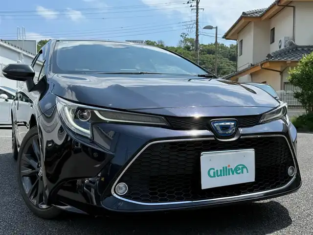 トヨタ カローラツーリング ハイブリッド ダブルバイビー 静岡県 2020(令2)年 8万km スパークリングブラックパールクリスタルシャイン ワンオーナー・保証書/車検令和9年6月29日まで/純正マルチメディア/　・ナビゲーション /USB/　・地デジ　/　・DVDプレイヤー/　・Bluetoothオーディオ/バックカメラ/ETC/ハーフレザーシート/前席シートヒーター/クルーズコントロール/ステアリングヒーター/スマートキー/プッシュスタート/電動パーキングブレーキ/純正LEDヘッドライト/LEDデイライト/純正ドアバイザー/純正フロアマット/オートハイビーム/ライトレベライザー/車両取説＋ナビ取説
