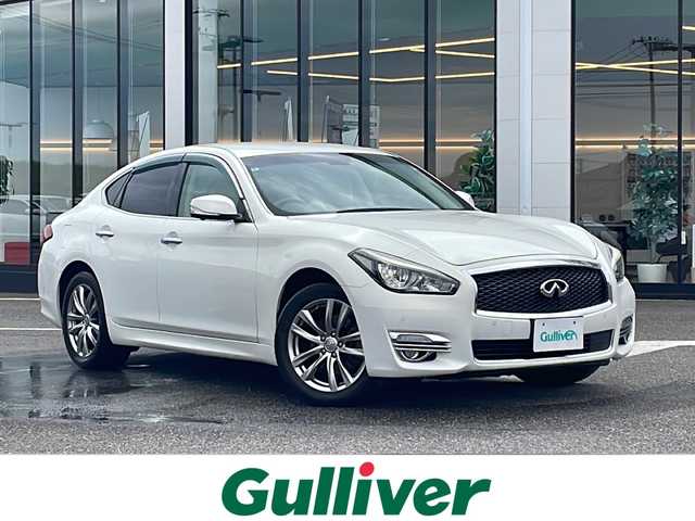 日産 フーガ 370GT FOUR 新潟県 2015(平27)年 8.1万km クリスタルホワイトパール 4WD/純正メモリナビ/（CD/DVD/ラジオ）/ワンセグTV/スマートキー/スペアキー/レザーシート/シートヒーター/シートメモリー/前席パワーシート/クルーズコントロール/MTモード付AT/前後コーナーセンサー/サンバイザー/助手席オットマン/ステアリングスイッチ/ドライブレコーダー/ETC/純正AW夏タイヤ/AW冬タイヤ積込/レーンキープアシスト/横滑り防止装置/オートライト/プッシュスタート/純正フロアマット
