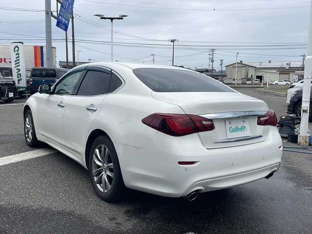 日産 フーガ 370GT FOUR 新潟県 2015(平27)年 8.1万km クリスタルホワイトパール 4WD/純正メモリナビ/（CD/DVD/ラジオ）/ワンセグTV/スマートキー/スペアキー/レザーシート/シートヒーター/シートメモリー/前席パワーシート/クルーズコントロール/MTモード付AT/前後コーナーセンサー/サンバイザー/助手席オットマン/ステアリングスイッチ/ドライブレコーダー/ETC/純正AW夏タイヤ/AW冬タイヤ積込/レーンキープアシスト/横滑り防止装置/オートライト/プッシュスタート/純正フロアマット
