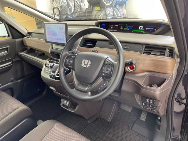 ホンダ フリード ハイブリット G 道央・札幌 2023(令5)年 1.4万km トワイライトミストブラックパール ・４WD/・ホンダセンシング/・コンフォートビューPG/・レーダークルーズコントロール/・衝突被害軽減ブレーキ/・レーンキープアシスト/・ディスプレイオーディオ/・Bluetooth/・AndroidAuto/AppleCarPlay/・バックカメラ/・両側パワースライドドア/・前席シートヒーター/・LEDヘッドライト/オートライト/・スマートキー/・純正エンジンスターター/・横滑り防止装置/盗難防止装置/・ETC   / 社外ドライブレコーダー前後（ZDR035）