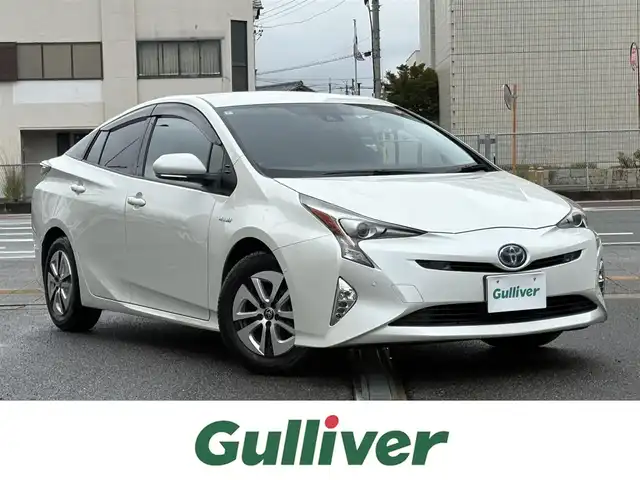 トヨタ プリウス A 三重県 2016(平28)年 1.3万km ホワイトパールクリスタルシャイン ♪ワンオーナー/♪走行12107km/♪車検 令和9年8月24日迄/プリクラッシュセーフティ/レーンディパーチャーアラート/ブラインドスポットモニター/オートマチックハイビーム/レーダークルーズコントロール/クリアランスソナー/インテリジェントクリアランスソナー/パーキングアシスト/スマートキー×2/プッシュスタート/純正9インチナビ/・フルセグ・SD録音/・DVD再生・CD/・Bluetoothオーディオ/・バックカメラ/ドライブレコーダー/スペアタイヤ/純正15インチAW/LEDヘッドライト/LEDフォグライト/オートライト/オートワイパー/ウィンカーミラー/オートリトラクタブルミラー/革巻ステアリング/ステアリングスイッチ/プライバシーガラス/フロアマット/ドアバイザー/ビルトインETC/サイド/カーテンエアバック