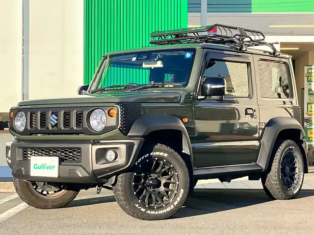 スズキ ジムニー シエラ JC 静岡県 2022(令4)年 6.7万km ジャングルグリーン 純正ディスプレイオーデイオ(CD/DVD/BT)/ドライブレコーダー360°/ETC/4WD/D席N席シートヒーター/エンジンスタートボタン/パワーステアリング/パワーウィンドウ/アイドリングストップ/スマートキー/オートエアコン/クルーズコントロール/USB入力端子/純正フロアマット/布シート/背面タイヤ/社外16インチアルミホイール/純正アルミホイール(サマータイヤ)車載/ABS/横滑り防止装置/レーンキープアシスト/盗難防止装置/オートライト/オートマチックハイビーム/ダウンヒルアシストコントロール/LEDヘッドライト/W+サイドエアバッグ/衝突軽減システム