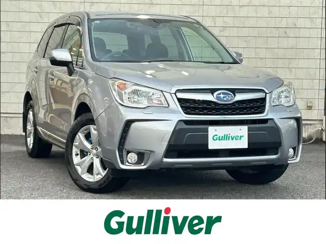 スバル フォレスター 2．0i－L アイサイト プラウドED 大分県 2015(平27)年 7.2万km アイスシルバーメタリック ・純正ナビ（CN-LR700D）/　ワンセグ・DVD/CD・Bluetooth・SD・ラジオ/・助手席回転シート/・アイサイト/　全車速追従機能付クルーズコントロール/　先行車発進お知らせ機能/　マルチファンクションディスプレイ/・プッシュエンジンスタート/・パワーシート/・ステアリングスイッチ/・ETC/・プリクラッシュセーフティシステム/・シートヒーターD席/・レーンキープアシスト/・横滑り制御システム/・ドライブレコーダー　SAA3060320/・純正17インチアルミホイル/・革巻きステアリング/・ウィンカーミラー/・リフトアップシート　N席/・ドアバイザー/・純正フロアマット/・取扱説明書/・保証書/・スペアキー１本