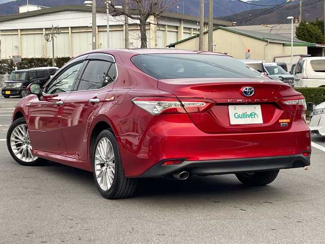 トヨタ カムリ G レザーパッケージ 長野県 2017(平29)年 11.8万km エモーショナルレッド 禁煙車/純正8インチナビ（CD/DVD/BD/フルセグTV/Bluetooth）/セーフティセンス/・プリクラッシュセーフティ/・レーントレーシングアシスト/・レーダークルーズコントロール/・オートマチックハイビーム/・ロードサインアシスト/・先行車発進告知機能/・ブラインドスポットモニター/・パーキングサポートブレーキ/バックカメラ/ビルトインETC/前席シートヒーター/前席パワーシート/ドライブレコーダー/ヘッドアップディスプレイ/革巻きステアリング/ステアリングスイッチ/電動パーキングブレーキ/ブレーキホールド/LEDヘッドライト/フォグランプ/オートライト/スマートキー/Pスタート/電動格納ミラー/純正18インチAW/純正フロアマット