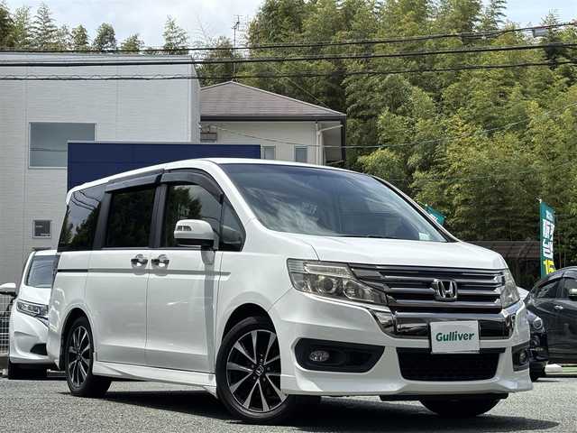 ホンダ ステップワゴン スパーダ Z クールスピリット 熊本県 2015(平27)年 12.6万km ホワイトオーキッドパール 純正メモリナビ(VXA-155VFNi)/【フルセグTV/SD/CD/DVD/Bluetooth】/バックカメラ/両側パワースライドドア/クルーズコントロール/ハーフレザーシート/パドルシフト/オートLEDライト/純正17インチアルミホイール/ビルトインETC/ドライブレコーダー(ZDR-015)/アイドリングストップ/横滑り防止装置/盗難防止装置/純正フロアマット/スマートキー/三列シート/ウォークスルー/取扱説明書