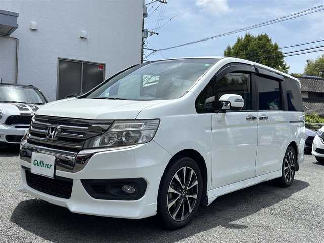 ホンダ ステップワゴン スパーダ Z クールスピリット 熊本県 2015(平27)年 12.6万km ホワイトオーキッドパール 純正メモリナビ(VXA-155VFNi)/【フルセグTV/SD/CD/DVD/Bluetooth】/バックカメラ/両側パワースライドドア/クルーズコントロール/ハーフレザーシート/パドルシフト/オートLEDライト/純正17インチアルミホイール/ビルトインETC/ドライブレコーダー(ZDR-015)/アイドリングストップ/横滑り防止装置/盗難防止装置/純正フロアマット/スマートキー/三列シート/ウォークスルー/取扱説明書