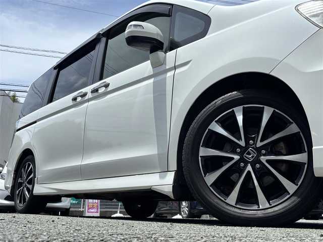 ホンダ ステップワゴン スパーダ Z クールスピリット 熊本県 2015(平27)年 12.6万km ホワイトオーキッドパール 純正メモリナビ(VXA-155VFNi)/【フルセグTV/SD/CD/DVD/Bluetooth】/バックカメラ/両側パワースライドドア/クルーズコントロール/ハーフレザーシート/パドルシフト/オートLEDライト/純正17インチアルミホイール/ビルトインETC/ドライブレコーダー(ZDR-015)/アイドリングストップ/横滑り防止装置/盗難防止装置/純正フロアマット/スマートキー/三列シート/ウォークスルー/取扱説明書
