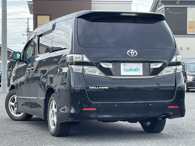 トヨタ ヴェルファイア 2．4Z プラチナセレクションⅡ 道央・札幌 2010(平22)年 15.4万km ブラック ４WD/純正メーカーナビ/CD/DVD/BT/フルセグ/純正フリップダウンモニター/横滑り防止装置/クリアランスソナー/バックカメラ/ビルトインETC/センターデフロック/両側パワースライドドア/パワーバックドア/2列目オットマン/革巻きウッドコンビステアリング/ステアリングリモコン/AC100V/MTモード付AT/プッシュスタート/スマートキー/HIDヘッドライト/オートライト/フォグランプ/電動格納ミラー/ウィンカーミラー/純正フロアマット/ドアバイザー/純正AW付夏タイヤ積込/235/50/R18/2018年/山5mm