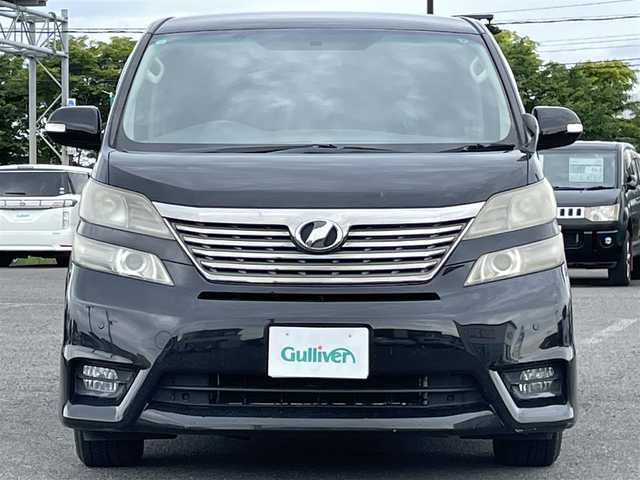 トヨタ ヴェルファイア 2．4Z プラチナセレクションⅡ 道央・札幌 2010(平22)年 15.4万km ブラック ４WD/純正メーカーナビ/CD/DVD/BT/フルセグ/純正フリップダウンモニター/横滑り防止装置/クリアランスソナー/バックカメラ/ビルトインETC/センターデフロック/両側パワースライドドア/パワーバックドア/2列目オットマン/革巻きウッドコンビステアリング/ステアリングリモコン/AC100V/MTモード付AT/プッシュスタート/スマートキー/HIDヘッドライト/オートライト/フォグランプ/電動格納ミラー/ウィンカーミラー/純正フロアマット/ドアバイザー/純正AW付夏タイヤ積込/235/50/R18/2018年/山5mm