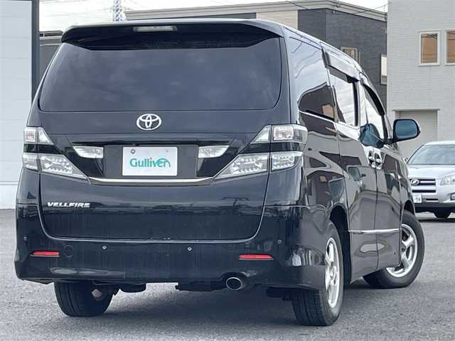 トヨタ ヴェルファイア 2．4Z プラチナセレクションⅡ 道央・札幌 2010(平22)年 15.4万km ブラック ４WD/純正メーカーナビ/CD/DVD/BT/フルセグ/純正フリップダウンモニター/横滑り防止装置/クリアランスソナー/バックカメラ/ビルトインETC/センターデフロック/両側パワースライドドア/パワーバックドア/2列目オットマン/革巻きウッドコンビステアリング/ステアリングリモコン/AC100V/MTモード付AT/プッシュスタート/スマートキー/HIDヘッドライト/オートライト/フォグランプ/電動格納ミラー/ウィンカーミラー/純正フロアマット/ドアバイザー/純正AW付夏タイヤ積込/235/50/R18/2018年/山5mm