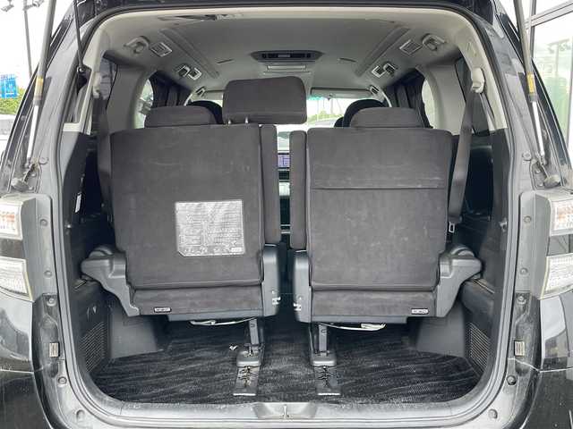 トヨタ ヴェルファイア 2．4Z プラチナセレクションⅡ 道央・札幌 2010(平22)年 15.4万km ブラック ４WD/純正メーカーナビ/CD/DVD/BT/フルセグ/純正フリップダウンモニター/横滑り防止装置/クリアランスソナー/バックカメラ/ビルトインETC/センターデフロック/両側パワースライドドア/パワーバックドア/2列目オットマン/革巻きウッドコンビステアリング/ステアリングリモコン/AC100V/MTモード付AT/プッシュスタート/スマートキー/HIDヘッドライト/オートライト/フォグランプ/電動格納ミラー/ウィンカーミラー/純正フロアマット/ドアバイザー/純正AW付夏タイヤ積込/235/50/R18/2018年/山5mm