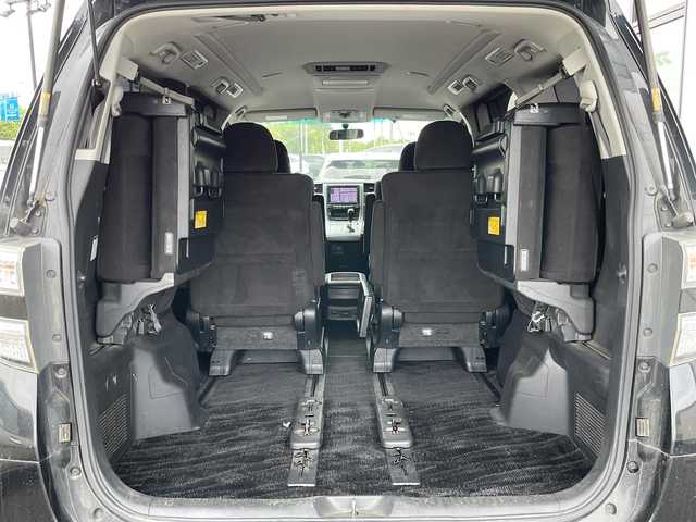 トヨタ ヴェルファイア 2．4Z プラチナセレクションⅡ 道央・札幌 2010(平22)年 15.4万km ブラック ４WD/純正メーカーナビ/CD/DVD/BT/フルセグ/純正フリップダウンモニター/横滑り防止装置/クリアランスソナー/バックカメラ/ビルトインETC/センターデフロック/両側パワースライドドア/パワーバックドア/2列目オットマン/革巻きウッドコンビステアリング/ステアリングリモコン/AC100V/MTモード付AT/プッシュスタート/スマートキー/HIDヘッドライト/オートライト/フォグランプ/電動格納ミラー/ウィンカーミラー/純正フロアマット/ドアバイザー/純正AW付夏タイヤ積込/235/50/R18/2018年/山5mm