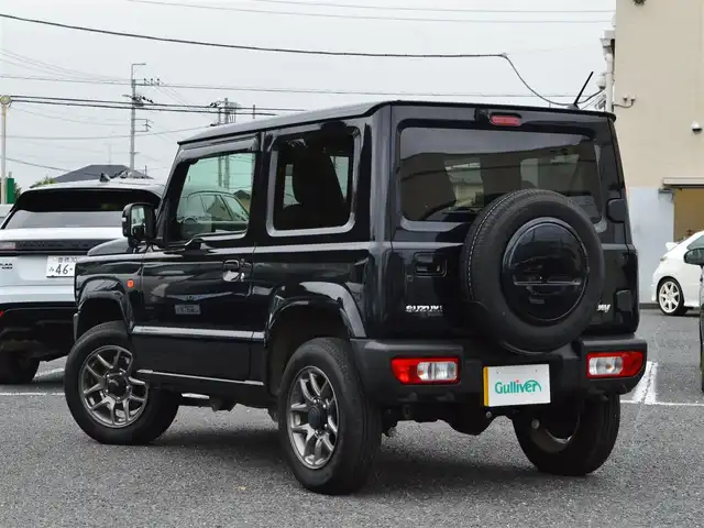 スズキ ジムニー XC 栃木県 2024(令6)年 0.9万km ミディアムグレーメタリック 4WD/スズキセーフティサポート/(レーザーレーダーと単眼カメラ/ディアルセンサーブレーキサポート/誤発進抑制機能/車線逸脱警報/ふらつき警報/先行車発進お知らせ機能/標識認識機能/リヤパーキングセンサー)/純正ナビ/(BT/AM/FM)/クルーズコントロール/前席シートヒーター/ETC/LEDヘッドライト/フォグランプ/オートライト/ステアスイッチ/プッシュスタート/スマートスペアキー×1/新車保証書/取扱説明書