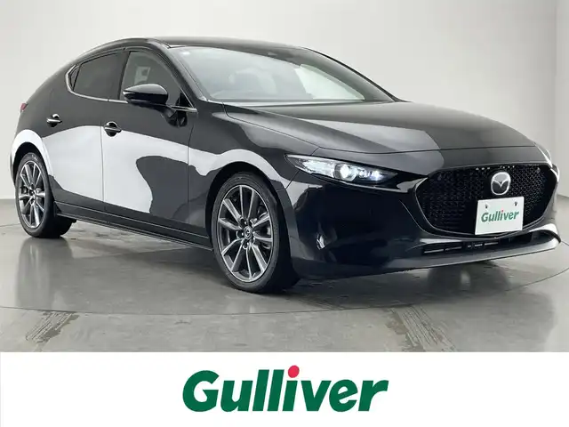 マツダ マツダ３ファストバック 20S Lパッケージ 愛知県 2020(令2)年 6.1万km ジェットブラックマイカ 純正ナビ　フルセグＴＶ　全方位カメラ　禁煙　ＤＶＤ　黒革　シートヒーター　前後ドラレコ　ＢＳＭ　ＨＵＤ　ＵＳＢ　ＨＤＭＩ　衝突軽減　追従クルコン　コーナーセンサー　ＬＥＤオートライト　ハンドルヒーター