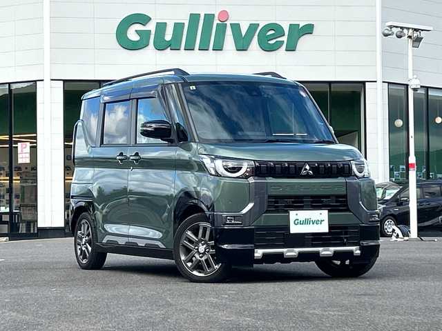 三菱 デリカミニ T プレミアム 佐賀県 2023(令5)年 2.3万km Ｄグリーン 社外9インチナビゲーション/マイパイロット/マルチアラウンドモニター/ステアリングヒーター/前席シートヒーター/デジタルインナーミラー/両側パワースライドドア/パドルシフト/社外ドライブレコーダー前後/ヒルディセントコントロール/助手席側電動スライドドア/衝突被害軽減ブレーキシステム/車線逸脱警報システム/車線維持支援機能/LEDヘッドライト/フォグランプ/純正15インチアルミホイール/スマートキー/スペアキー×１