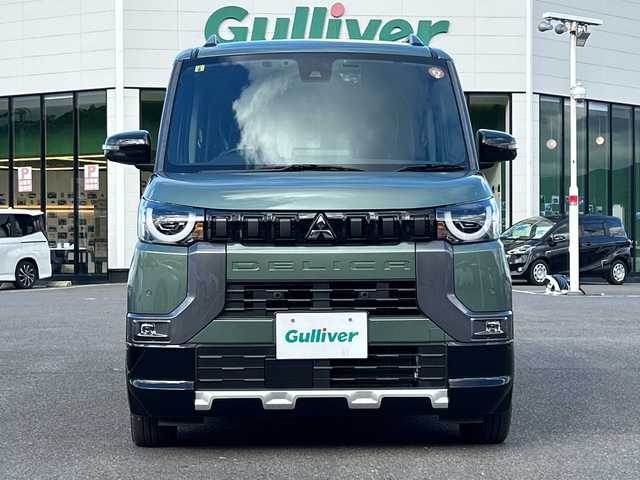 三菱 デリカミニ T プレミアム 佐賀県 2023(令5)年 2.3万km Ｄグリーン 社外9インチナビゲーション/マイパイロット/マルチアラウンドモニター/ステアリングヒーター/前席シートヒーター/デジタルインナーミラー/両側パワースライドドア/パドルシフト/社外ドライブレコーダー前後/ヒルディセントコントロール/助手席側電動スライドドア/衝突被害軽減ブレーキシステム/車線逸脱警報システム/車線維持支援機能/LEDヘッドライト/フォグランプ/純正15インチアルミホイール/スマートキー/スペアキー×１