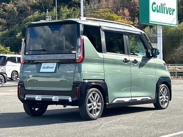 三菱 デリカミニ T プレミアム 佐賀県 2023(令5)年 2.3万km Ｄグリーン 社外9インチナビゲーション/マイパイロット/マルチアラウンドモニター/ステアリングヒーター/前席シートヒーター/デジタルインナーミラー/両側パワースライドドア/パドルシフト/社外ドライブレコーダー前後/ヒルディセントコントロール/助手席側電動スライドドア/衝突被害軽減ブレーキシステム/車線逸脱警報システム/車線維持支援機能/LEDヘッドライト/フォグランプ/純正15インチアルミホイール/スマートキー/スペアキー×１