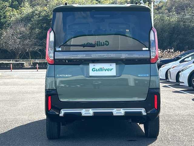 三菱 デリカミニ T プレミアム 佐賀県 2023(令5)年 2.3万km Ｄグリーン 社外9インチナビゲーション/マイパイロット/マルチアラウンドモニター/ステアリングヒーター/前席シートヒーター/デジタルインナーミラー/両側パワースライドドア/パドルシフト/社外ドライブレコーダー前後/ヒルディセントコントロール/助手席側電動スライドドア/衝突被害軽減ブレーキシステム/車線逸脱警報システム/車線維持支援機能/LEDヘッドライト/フォグランプ/純正15インチアルミホイール/スマートキー/スペアキー×１