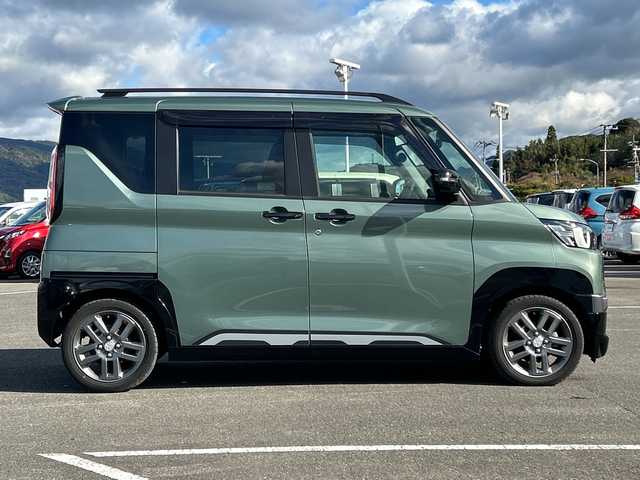 三菱 デリカミニ T プレミアム 佐賀県 2023(令5)年 2.3万km Ｄグリーン 社外9インチナビゲーション/マイパイロット/マルチアラウンドモニター/ステアリングヒーター/前席シートヒーター/デジタルインナーミラー/両側パワースライドドア/パドルシフト/社外ドライブレコーダー前後/ヒルディセントコントロール/助手席側電動スライドドア/衝突被害軽減ブレーキシステム/車線逸脱警報システム/車線維持支援機能/LEDヘッドライト/フォグランプ/純正15インチアルミホイール/スマートキー/スペアキー×１