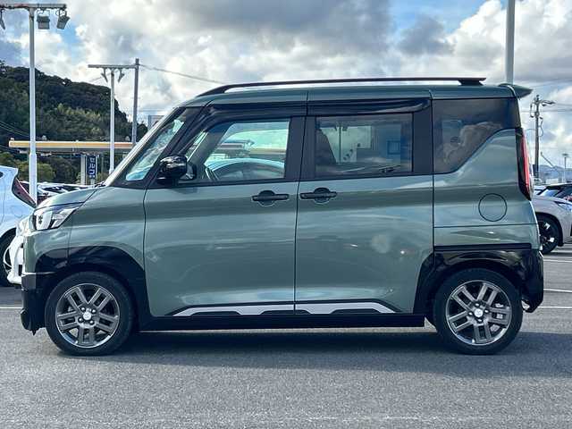 三菱 デリカミニ T プレミアム 佐賀県 2023(令5)年 2.3万km Ｄグリーン 社外9インチナビゲーション/マイパイロット/マルチアラウンドモニター/ステアリングヒーター/前席シートヒーター/デジタルインナーミラー/両側パワースライドドア/パドルシフト/社外ドライブレコーダー前後/ヒルディセントコントロール/助手席側電動スライドドア/衝突被害軽減ブレーキシステム/車線逸脱警報システム/車線維持支援機能/LEDヘッドライト/フォグランプ/純正15インチアルミホイール/スマートキー/スペアキー×１
