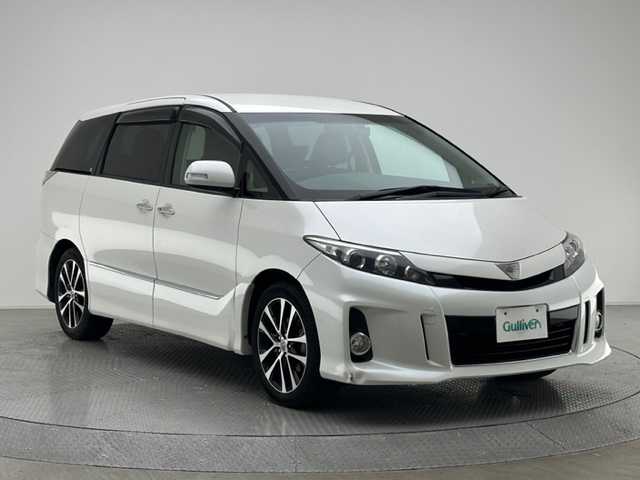 トヨタ エスティマ アエラス プレミアムエディション 兵庫県 2013(平25)年 6.9万km ホワイトパールクリスタルシャイン プレミアムエディション/専用内外装/社外SDナビ(CD/DVD/SD/Bt/フルセグ)/・CN-S300WD/アルパインリアモニター/ステアリングスイッチ/バックカメラ/前後ドライブレコーダー/両側パワースライドドア /クルーズコントロール/ハーフレザーシート/パワーシート/HID/フォグライト /ビルトインETC/純正マット・バイザー