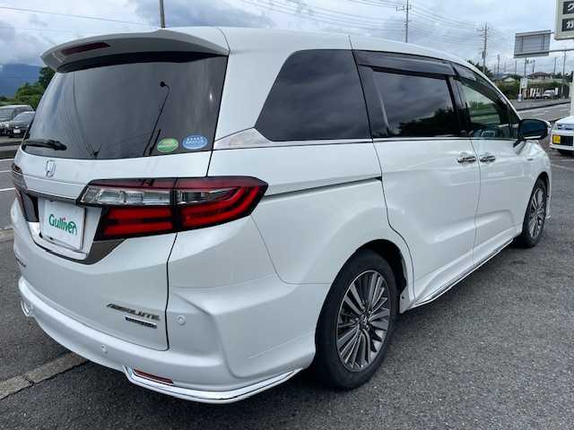 ホンダ オデッセイ ハイブリッド アブソルート・EXホンダセンジング 神奈川県 2018(平30)年 8.1万km プラチナホワイトパール ホンダセンシング/・衝突軽減ブレーキ/・歩行者事故低減ステアリング/・アダプティブクルーズコントロール/・車線維持支援システム/・路外逸脱抑制機能/・誤発進抑制機能/・先行車発進お知らせ機能/・標識認識機能/1オーナー/純正フリップダウンモニター/純正9型SDナビ/フルセグTV/【CD/DVD/SD/Bluetooth/USB/AUX/ipod】/マルチビューカメラシステム/ビルトインETC2.0/前後ドライブレコーダー/両側パワースライドドア/AC100V電源/ハーフレザーシート/D/N席パワーシート/D/Nシートヒーター/オートライト/LEDヘッドランプ/LEDフロントフォグランプ/オートライト/215/55R17インチ純正AW/プッシュスタート/スマートキー/エンジンスターター/純正フロアマット/フリップダウンモニター