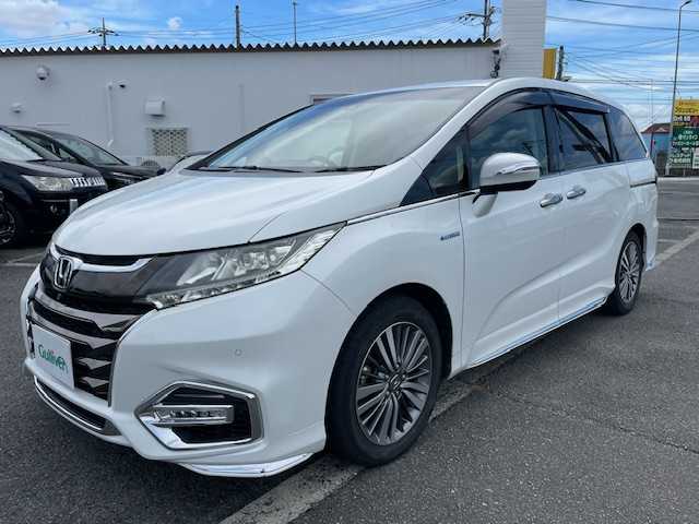 ホンダ オデッセイ ハイブリッド アブソルート・EXホンダセンジング 神奈川県 2018(平30)年 8.1万km プラチナホワイトパール ホンダセンシング/・衝突軽減ブレーキ/・歩行者事故低減ステアリング/・アダプティブクルーズコントロール/・車線維持支援システム/・路外逸脱抑制機能/・誤発進抑制機能/・先行車発進お知らせ機能/・標識認識機能/1オーナー/純正フリップダウンモニター/純正9型SDナビ/フルセグTV/【CD/DVD/SD/Bluetooth/USB/AUX/ipod】/マルチビューカメラシステム/ビルトインETC2.0/前後ドライブレコーダー/両側パワースライドドア/AC100V電源/ハーフレザーシート/D/N席パワーシート/D/Nシートヒーター/オートライト/LEDヘッドランプ/LEDフロントフォグランプ/オートライト/215/55R17インチ純正AW/プッシュスタート/スマートキー/エンジンスターター/純正フロアマット/フリップダウンモニター
