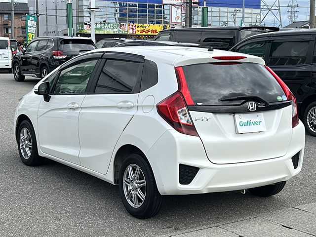ホンダ フィット 13G Fパッケージ ファインED 石川県 2016(平28)年 6.7万km プレミアムホワイトパールⅡ フルセグテレビ/純正ナビ/バックカメラ/ビルトインETC/前後ドライブレコーダー/スマートキー/プッシュスタート/ドアバイザー/スタッドレスアルミＳＥＴ　