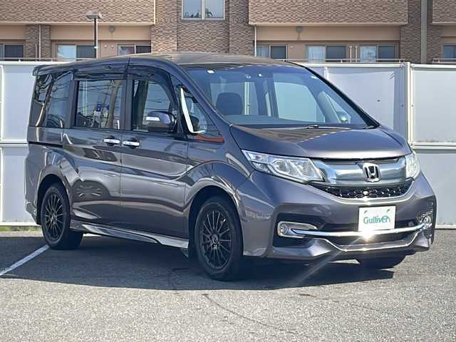 ホンダ ステップワゴン スパーダ ホンダセンシング 秋田県 2016(平28)年 9.7万km モダンスティールM 4WD/純正インターナビ(VXM-175VFNi)/CD/DVD/BT/フルセグテレビ/ミュージックサーバー/バックカメラ/ETC/フリップダウンモニター/衝突被害軽減ブレーキ/レーンキープアシスト/レーダークルーズコントロール/両側パワースライドドア/パドルシフト/ステアリングスイッチ/ミラーヒーター/スマートキー/プッシュスタート/LEDヘッドライト/オートライト/フォグランプ/16インチ社外アルミスタッドレス/純正16インチアルミホイール積み込み