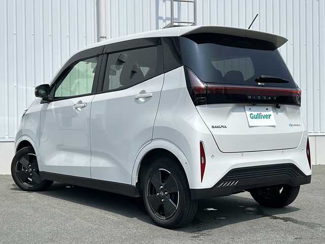 日産 サクラ G 三重県 2022(令4)年 3.1万km ホワイトパール 純正ナビ/全周囲カメラ/シートヒーター/ステアリングヒーター/ステアリングリモコン/USB・タイプC給電ポート/ハンドル支援/プロパイロット/レーダークルーズコントロール/純正フロアマット/電子パーキング/ビルトインETC2.0/電動格納ミラー/禁煙車