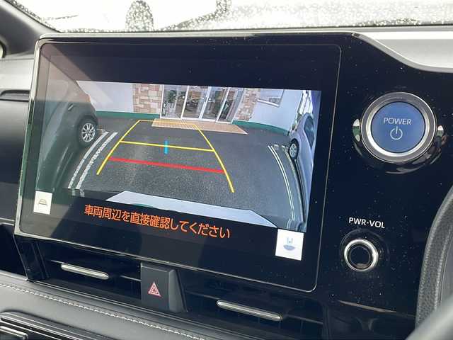 トヨタ ノア ハイブリッド S－Z 徳島県 2022(令4)年 5.9万km アティチュードブラックマイカ 純正10.5インチディスプレイオーディオ（コネクティッドナビ対応）/快適パッケージhi/純正フリップダウンモニター/バックカメラ/両側パワースライドドア/レーダークルーズコントロール/全席シータヒーター/トヨタセーフティセンス/プリクラッシュセーフティ〔PCS〕/レーントレーシングアシスト〔LTA〕/アダプティブハイビームシステム〔AHS〕/ブラインドスポットモニター〔BSM〕/コーナーセンサー/ハーフレザーシート/オットマン/LEDヘッドライト/オートハイビーム/前後ドライブレコーダー/純正17AW/純正フロアマット/プッシュスタート/スマートキー/スペアキー