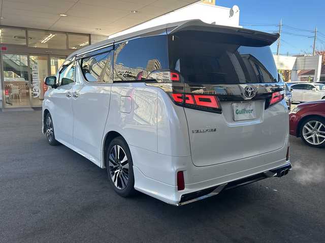 トヨタ ヴェルファイア Z Gエディション 京都府 2018(平30)年 8万km ホワイトパールクリスタルシャイン 社外メモリナビ/フルセグテレビ/バックカメラ/Bluetooth/フリップダウンモニター/ウィンカーミラー/オットマン/キャプテンシート/クルーズコントロール/ドアバイザー/プッシュスタート/両側パワースライドドア/パワーバックドア/ETC/デジタルインナーミラー/モデリスタエアロ