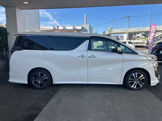 トヨタ ヴェルファイア Z Gエディション 京都府 2018(平30)年 8万km ホワイトパールクリスタルシャイン 社外メモリナビ/フルセグテレビ/バックカメラ/Bluetooth/フリップダウンモニター/ウィンカーミラー/オットマン/キャプテンシート/クルーズコントロール/ドアバイザー/プッシュスタート/両側パワースライドドア/パワーバックドア/ETC/デジタルインナーミラー/モデリスタエアロ
